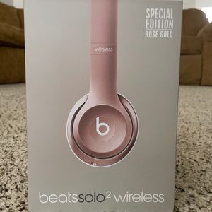 Rose gold Beats headphones.